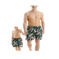 Otac i sin koji odgovaraju kupaćim kovčezima, lišće printuje kupaći kostimi za plaža, letnje kupaćih